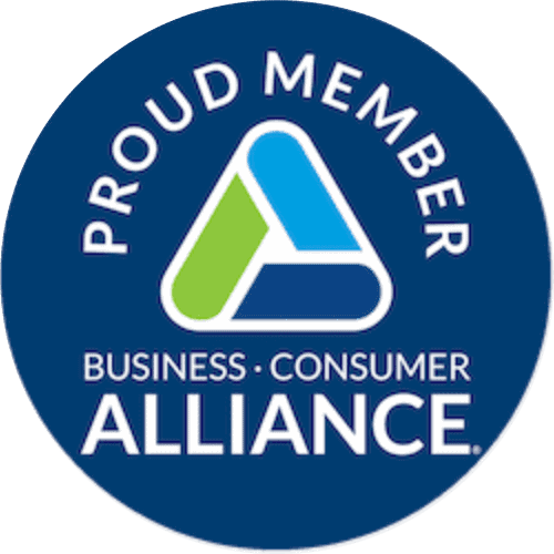 Blue circular badge with the words "Proud Member Business · Consumer Alliance" and a triangular logo in the center.