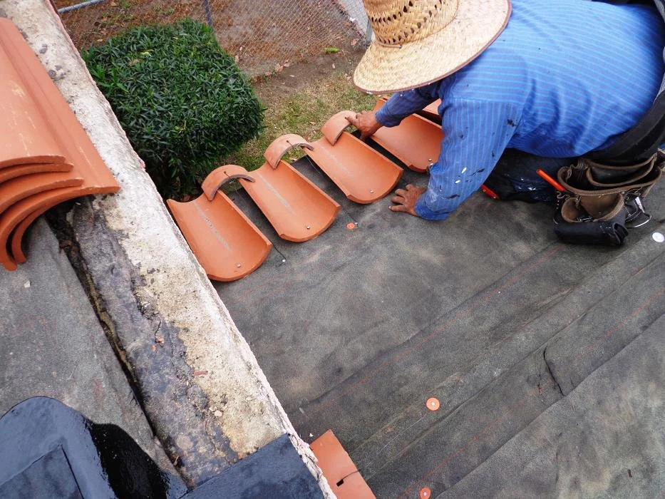 Clay or concrete tile roof installation on a Los Angeles County, California home, showing neatly aligned rows of durable roofing tiles designed for long-lasting protection and curb appeal