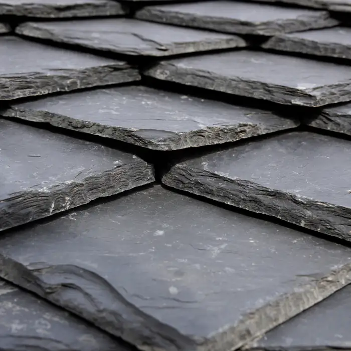 Gray slate roof tiles installed on a home in Orange County, California, offering clean lines, durable protection, and a timeless look